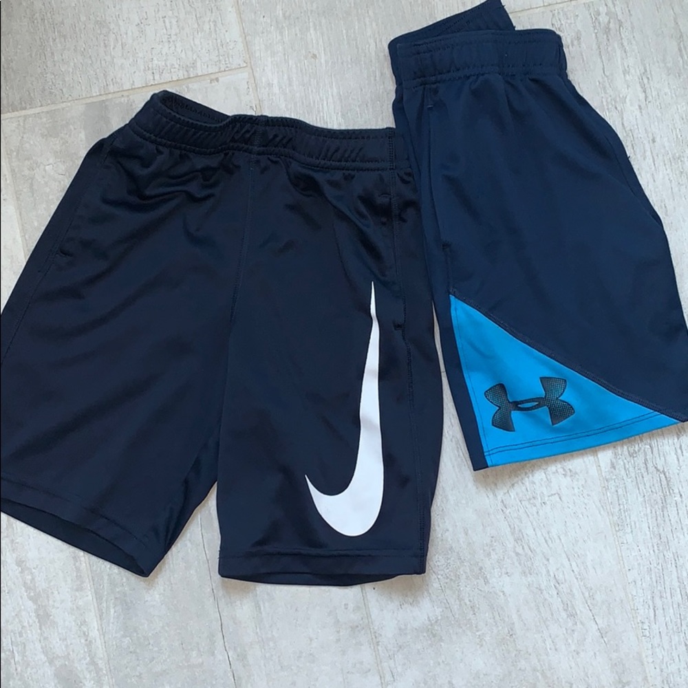 Two pairs of boy shorts- Nike and Under Armor, 7